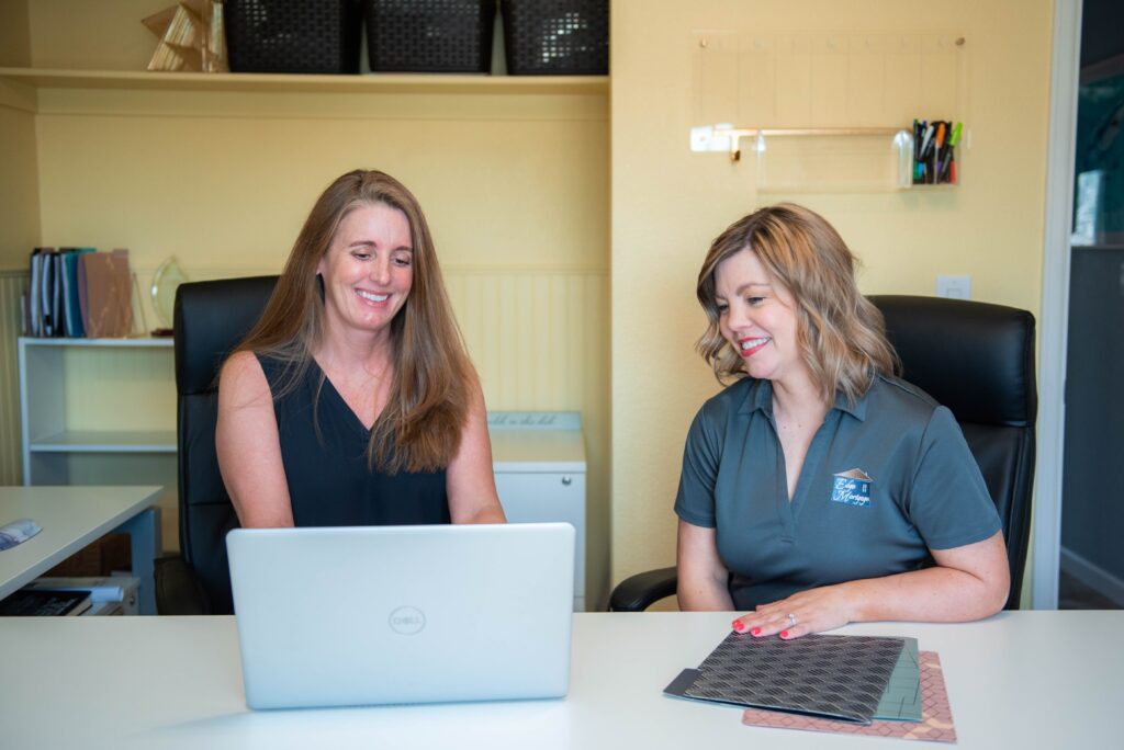 What are trigger leads? Photo of Edge Mortgage, Inc. team working at desk